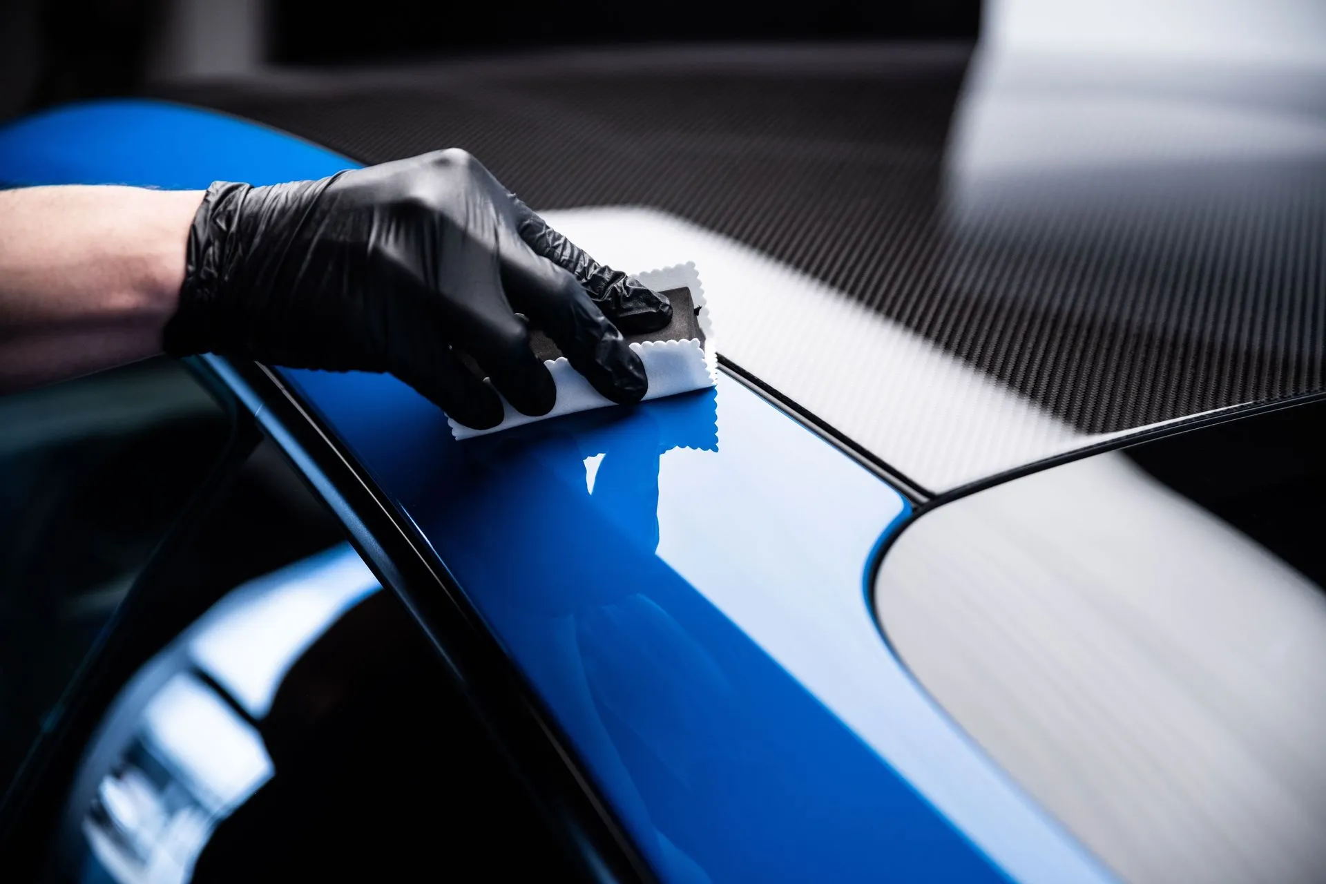 Ceramic coating application at Moojo Auto Spa