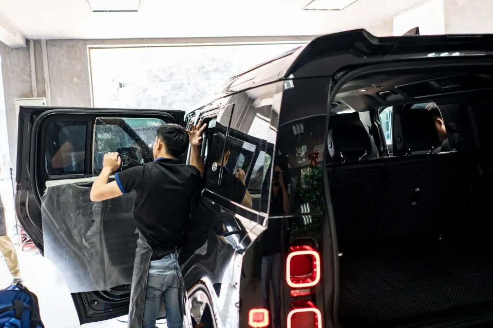 Professional window tinting at Moojo Auto Spa